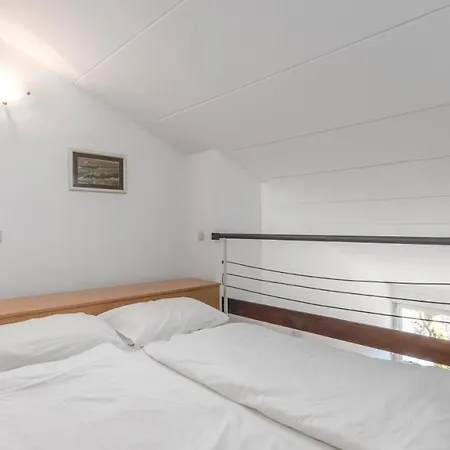 Apartamento Rona Volta